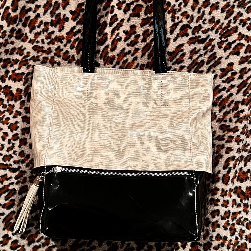 Tote with off-white animal texture with black patent leather.